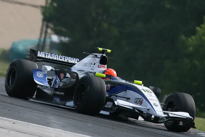 Team ZX1-sponsored formula race car showcasing the brand’s motorsport heritage and performance lubricant history.